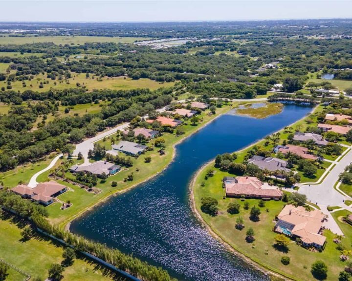 An aerial view of a neighborhood with houses.